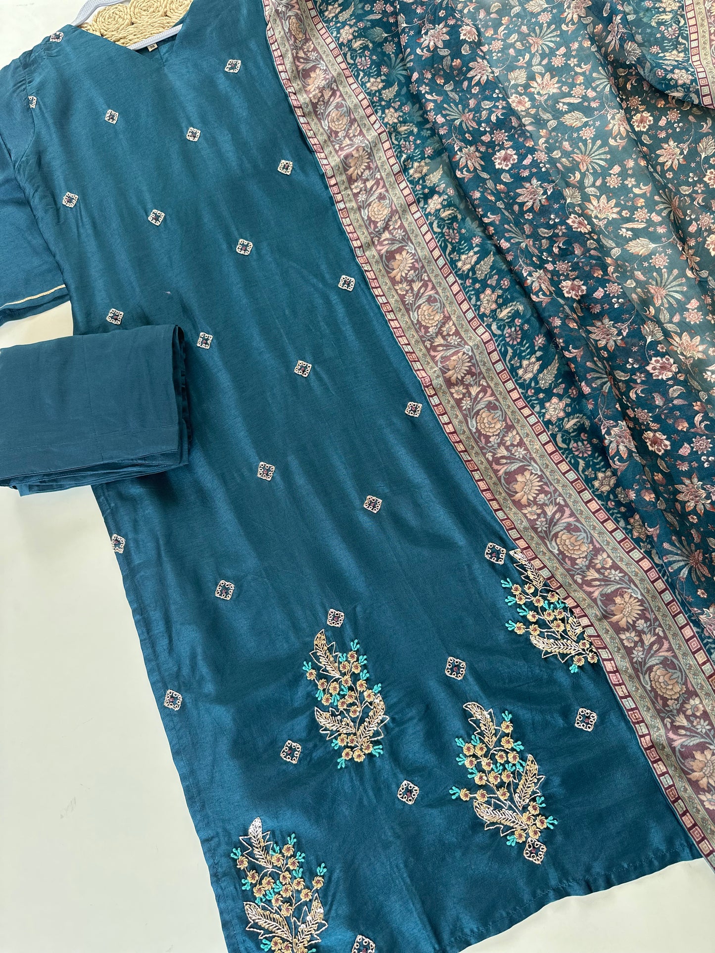 K337 - Russian silk kurti with pants and viscose organza printed dupatta .