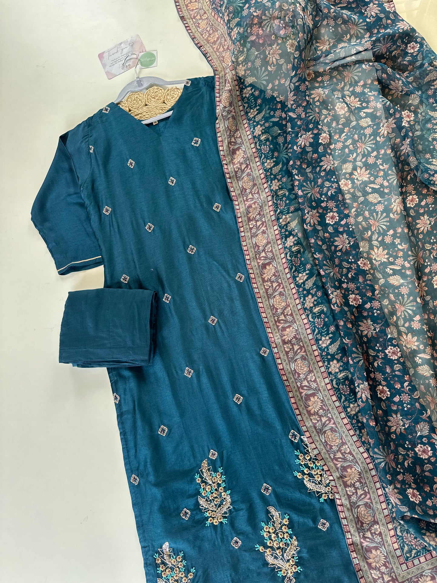 K337 - Russian silk kurti with pants and viscose organza printed dupatta .