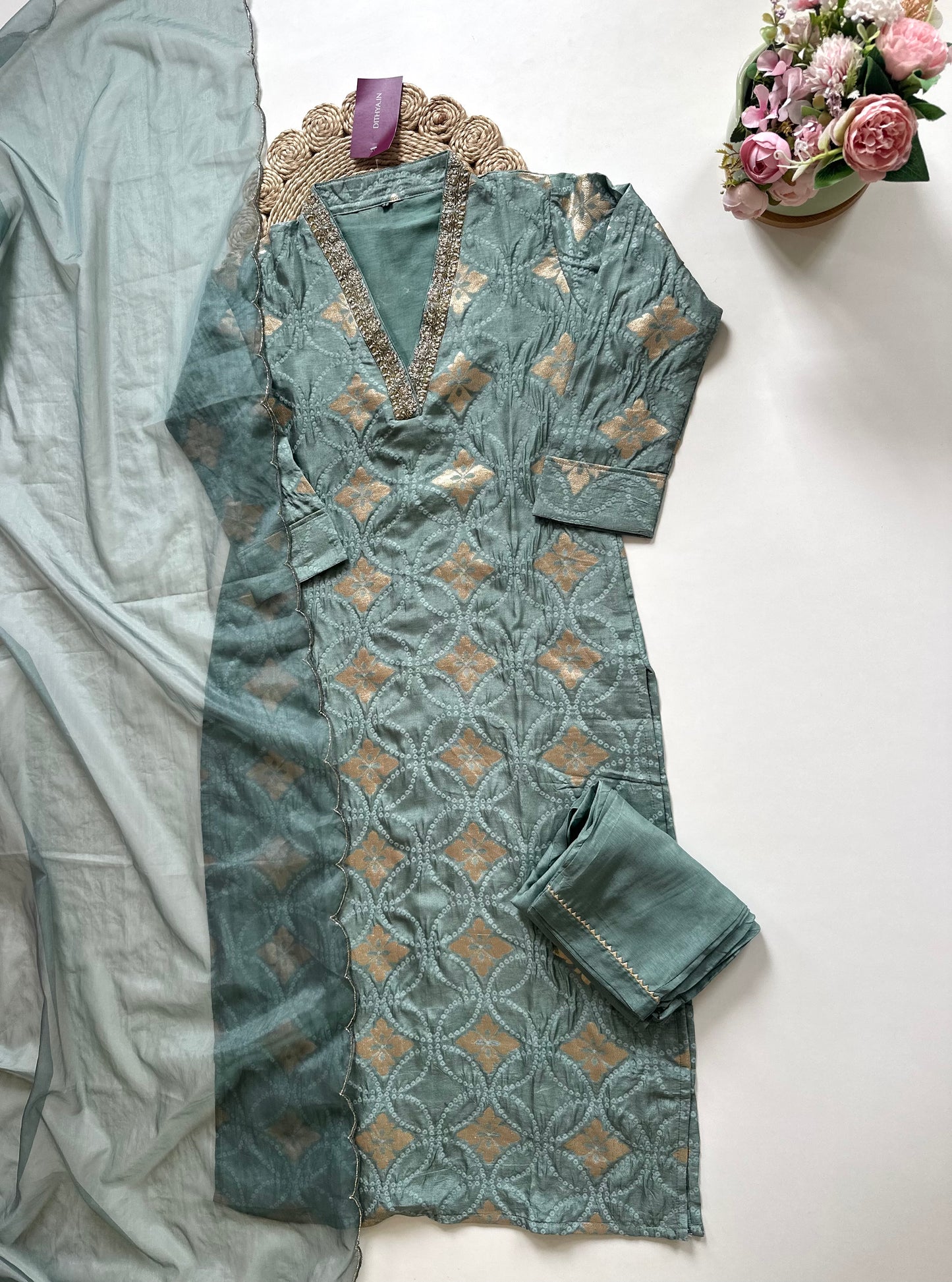 K134 - Dola silk jacquard straight kurti with pants and organza dupatta .