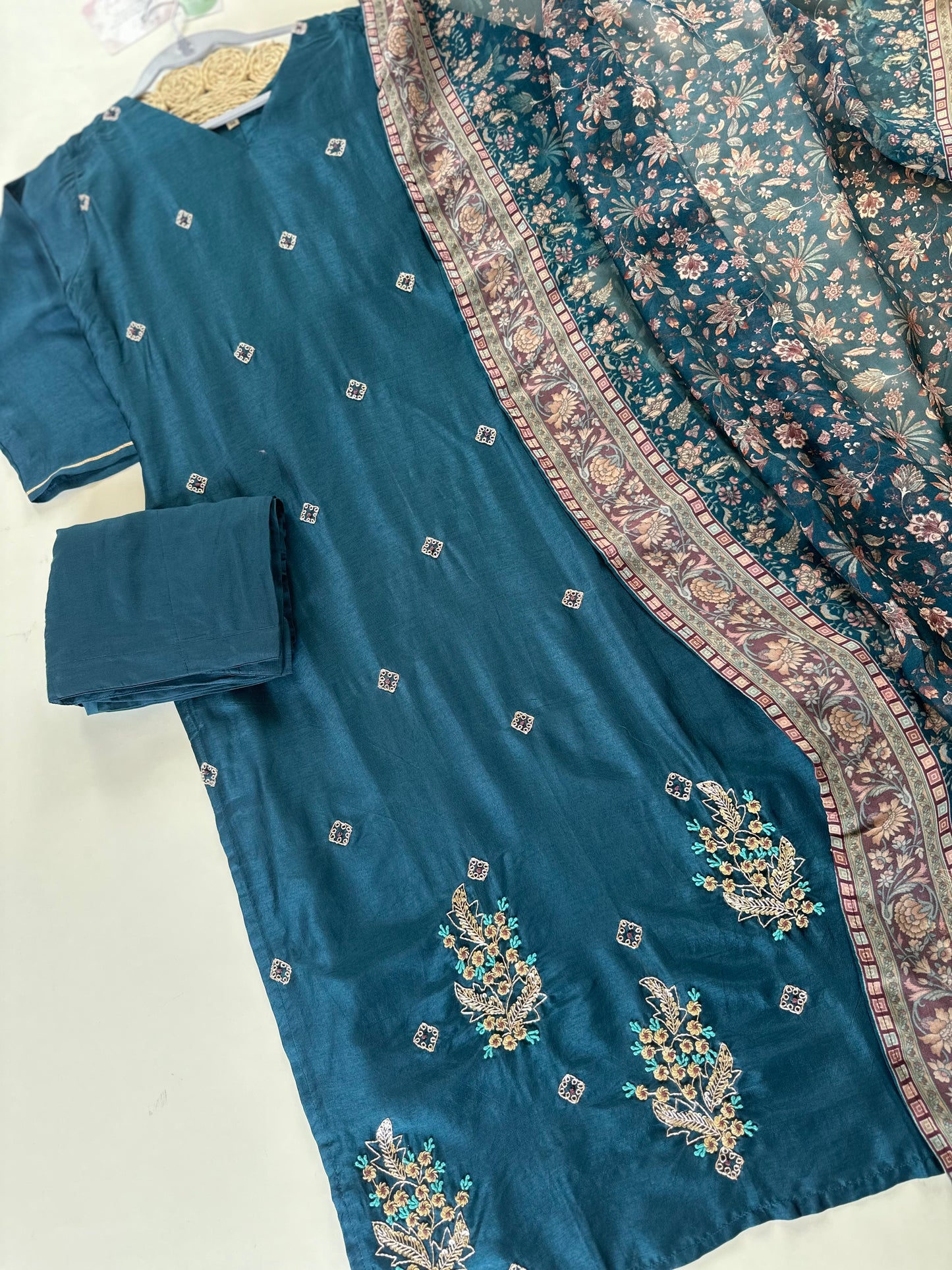 K337 - Russian silk kurti with pants and viscose organza printed dupatta .